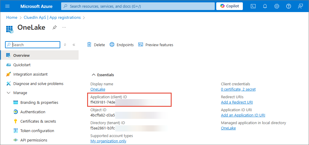 Azure app registration Overview page for OneLake with the Application (client) ID highlighted under Essentials